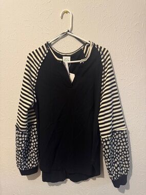 Black Raglan Pullover with Striped and Daisy-Sleeve Detail